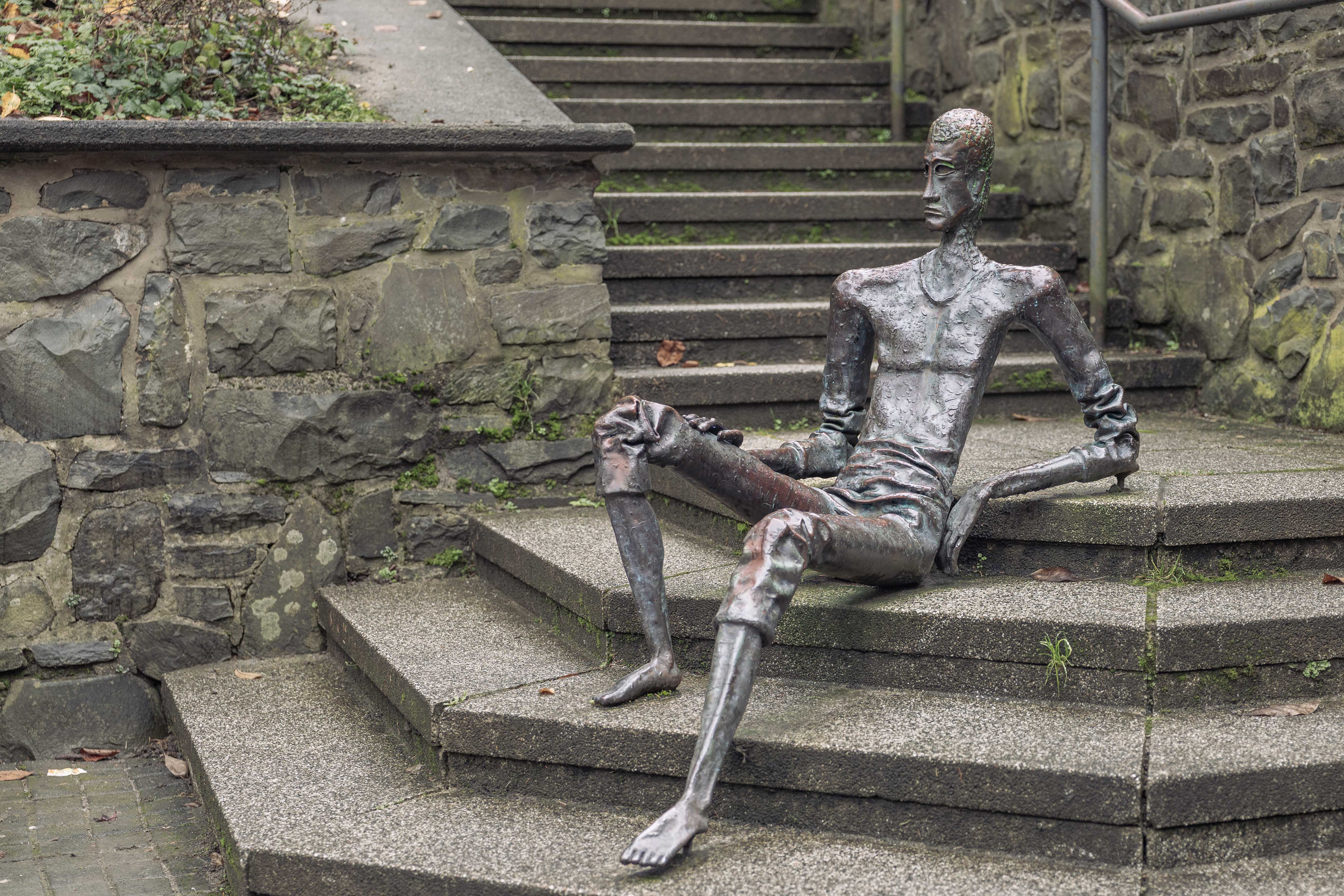 Mann am Glockenspiel in Altena